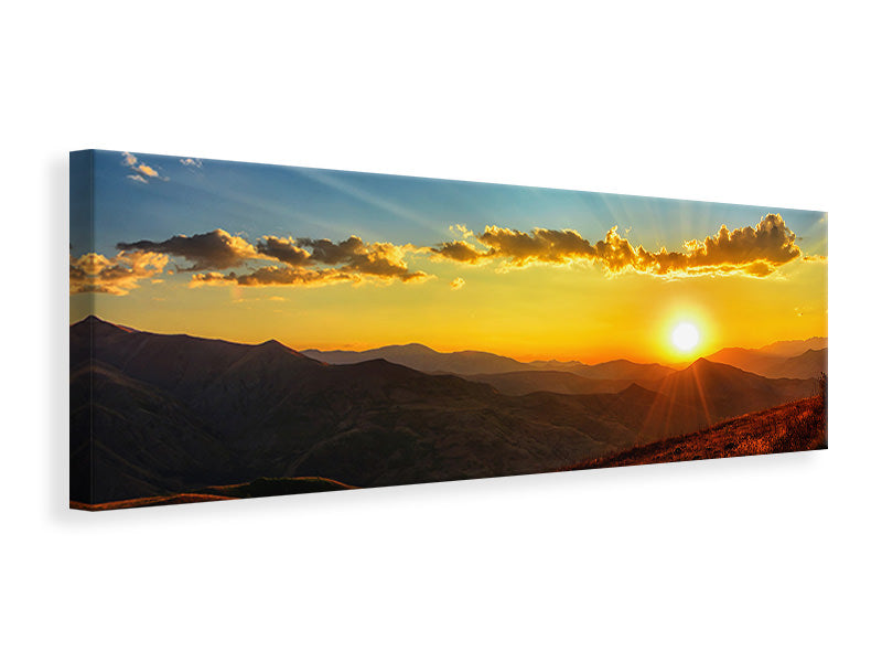 panoramic-canvas-print-sunset-in-the-world-of-mountains