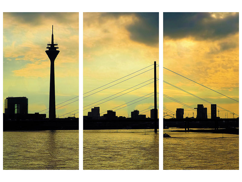 3-piece-canvas-print-skyline-in-the-evening-light