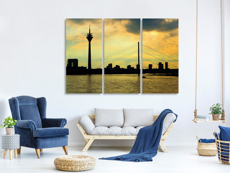 3-piece-canvas-print-skyline-in-the-evening-light