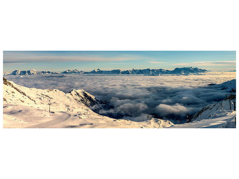 panoramic-canvas-print-above-the-clouds-in-the-snow